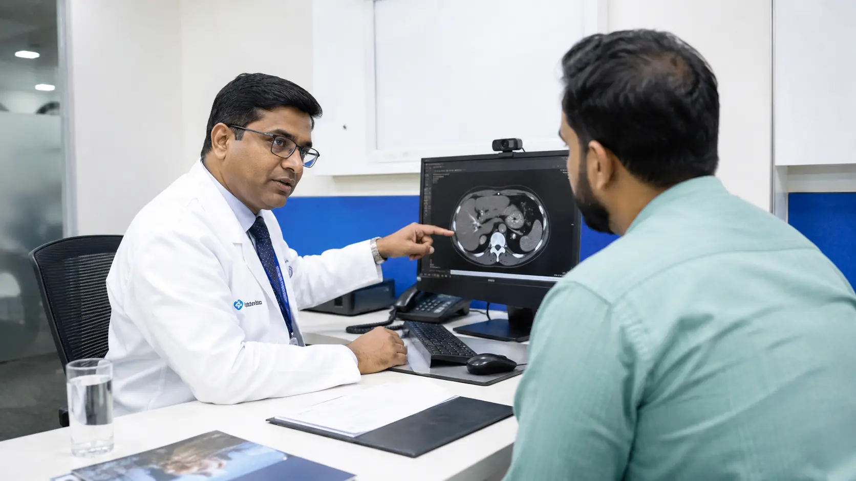 Doctor explaining medical imaging to patient